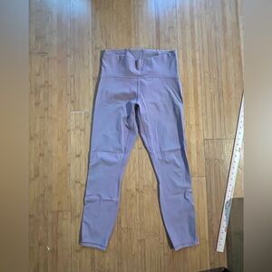 Lululemon train times legging 25” mesh on side. Faded near back. Good condition.